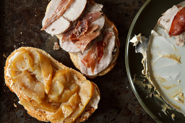 apples and pork on an open faced sandwich