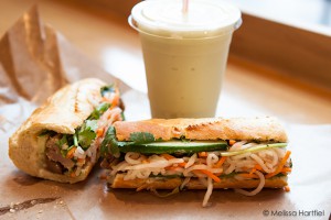two banh mi and a honeydew smoothie
